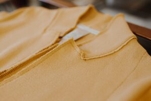 beige textile on brown table